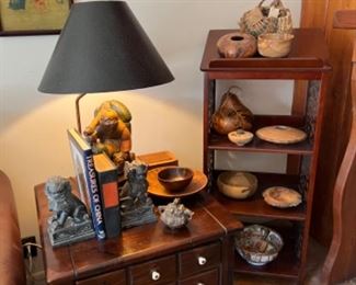 End table with drawer, stone/ marble foo dog bookends, carved signed wood bowls, asian lamp