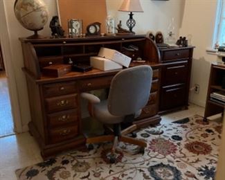 Desk, chair, clocks, globe, rug