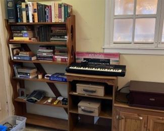 Keyboard, books, shelves