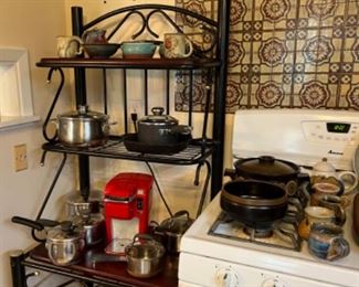 Bakers rack, pots, pans, pottery