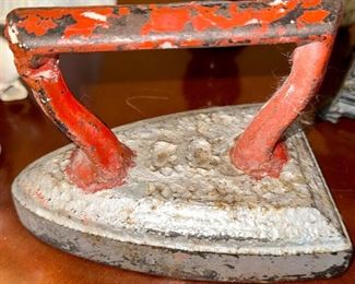 Vintage Hand Iron with Red Handle, very Heavy.