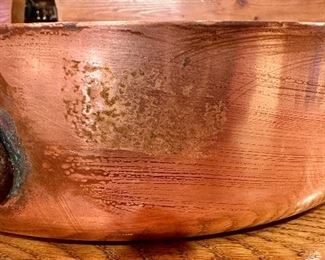 A ton of copper pots and pans, made in France,  perfect for cooking or displaying - they are quite beautiful!