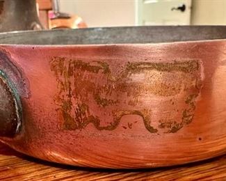 A ton of copper pots and pans, made in France,  perfect for cooking or displaying - they are quite beautiful!