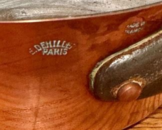 A ton of copper pots and pans, made in France,  perfect for cooking or displaying - they are quite beautiful!