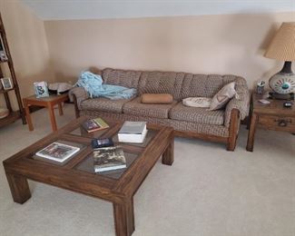 Solid wood/upholstery 7' sofa, rolled arms and back for comfort.  Side table and glass top coffee table