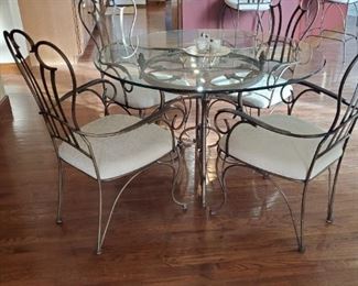Elegant Scrolled arms and back set of (4) chairs with the same working on the approx diameter 54"