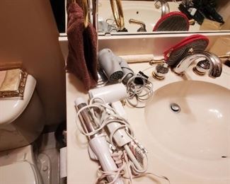 Curling irons/dryers etc