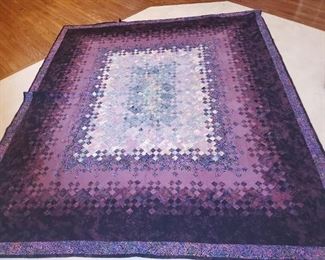 Sadly this very nice pieced quilt is machine quilted...