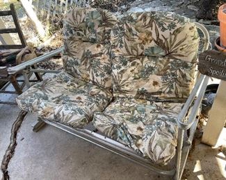 coolest vintage  patio loveseat- may be a glider  don't remember  but a super gem with a little tlc 