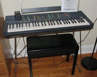 YAMAHA ORGAN WITH BENCH.