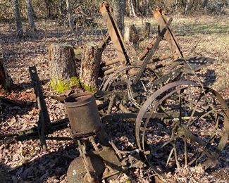 Antique farming implements or yard art