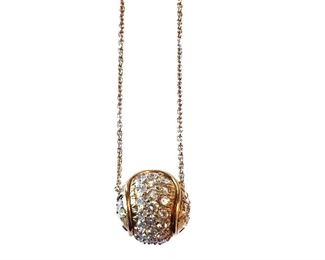 4j2. Gold diamond tennis ball on a chain