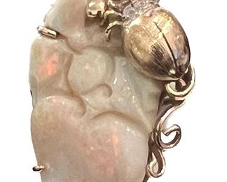 4r5. Opal and gold ring