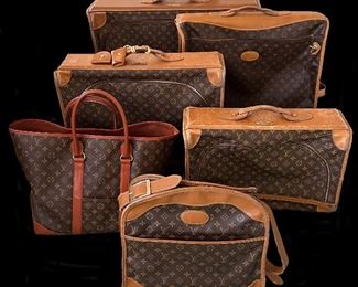 5j. Louis Vuitton soft pack luggage
