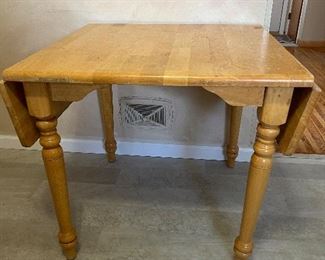 Oak drop-leaf dining table