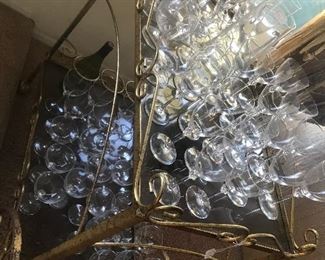 large collection of Daum Nancy stemware on lovely bar cart