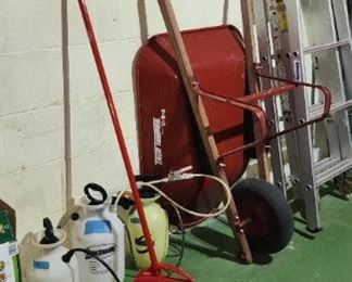 Wheelbarrow and extension ladder
