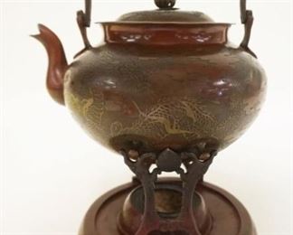 1031	ANTIQUE ASIAN COPPER & BRASS TEAPOT ON STAND W/ETCHED DRAGONS, TEAPOT W/HANDLE APPROXIMATELY 7 IN HIGH
