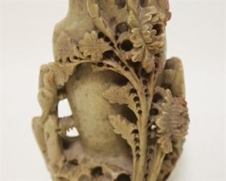 1050	SOAPSTONE CARVING OF VASE W/FLOWERS, APPROXIMATELY 7 IN HIGH

