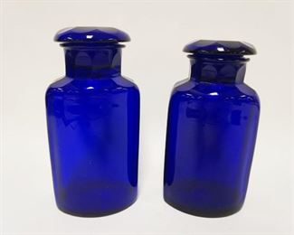 1107	PAIR OF APOTHECARY COBALT BLUE JARS W/GROUND & POLISHED BOTTOMS & GROUND & POLISHED STOPPERS, APPROXIMATELY 9 3/4 IN HIGH
