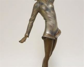 1120	ART DECO METAL STATUE OF WOMAN ON MARBLE BASE, APPROXIMATELY 17 IN HIGH
