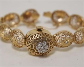 1150	LADY'S GOLD WRISTWACH AXA 17 JEWELS INCABLOC SWISS WATCH CASE MARKED 14KT GOLD, BAND MARKED 14KT GOLD 16.1 DWT
