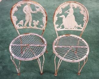 1161	PAIR OF METAL GARDEN CHAIRS W/CAST METAL COURTING SCENES
