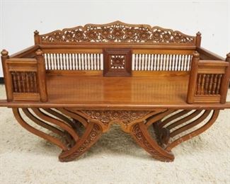 1165	INTRICATELY CARVED AFRICAN MAHOGANY BENCH W/SPINDLE BACK & SIDES, APPROXIMATELY 60 IN X 25 IN X35 IN HIGH
