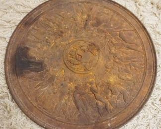 1201	ROUND CAST IRON PIECE WITH EMBOSSED NEO CLASSICAL FIGURES, APPROXIMATELY 16 IN
