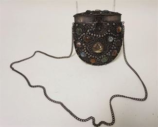 1203	METAL PURSE W/APPLIED SCROLL WORK & POLISHED STONES
