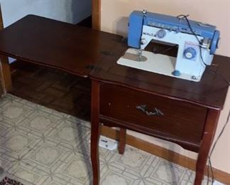 white antique sewing machine