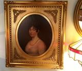 Gorgeous antique portrait painting in an antique gold gilted frame.