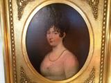 Gorgeous antique portrait painting in an antique gold gilted frame.