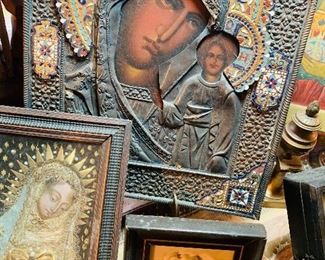 The large center one is Our Lady of Kazan, a Russian Orthodox icon. 