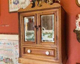 the second of our very  early  hanging  cabinets