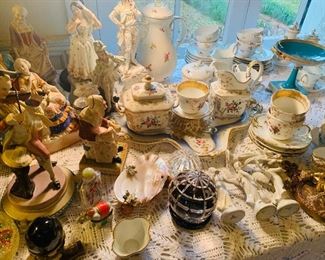 Can you see the "Scattered Flowers" Meissen tea set in the middle back-- We also have a 5 piece Meissen "pink roses" tea set, and Meissen musical angels