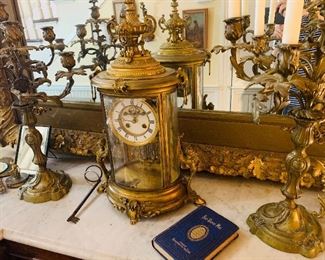 French garniture--(set of three)  Gilded mantle clock and matching  candleabras
