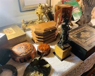 Many early wooden boxes and notice the sienna marble and bronze statue of Napoleon