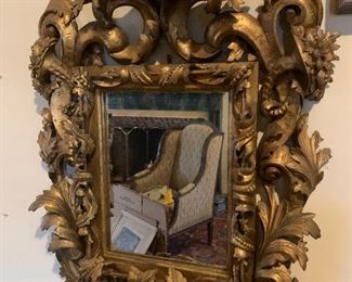 ornate  carved  mirror