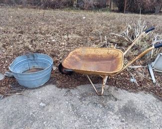 wheelbarrow and washtub - both have holes
