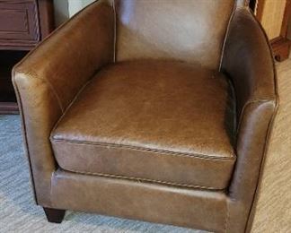 Brown faux leather accent chair