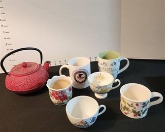 Cast iron tea pot and coffee cups