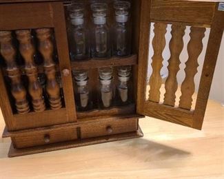 Vintage wooden spice rack 14" tall and 12 jars