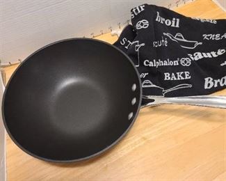Calphalon 10" diameter, 3.25" tall pan with towel
