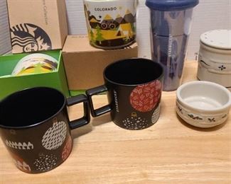 Starbucks mugs and Longaberger pottery pieces