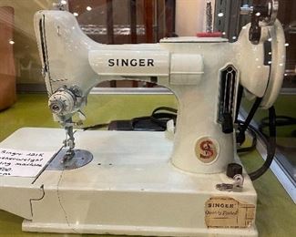 Singer 221K - NICE!  This item is FIRM and will not go down in price.