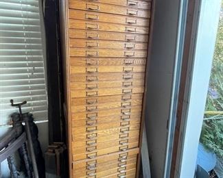Absolutely stunning 32 Drawer Oak Flat File Cabinet.  This piece is gorgeous and ready to take on prints, maps, documents or files!