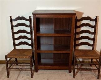 Wooden Book Shelf And Two Wicker Bottom Chairs