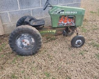 Vintage toy peddle tractor 