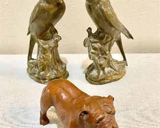 Brass Parakeets with red stone eyes (one if missing). Old carved Bulldog.